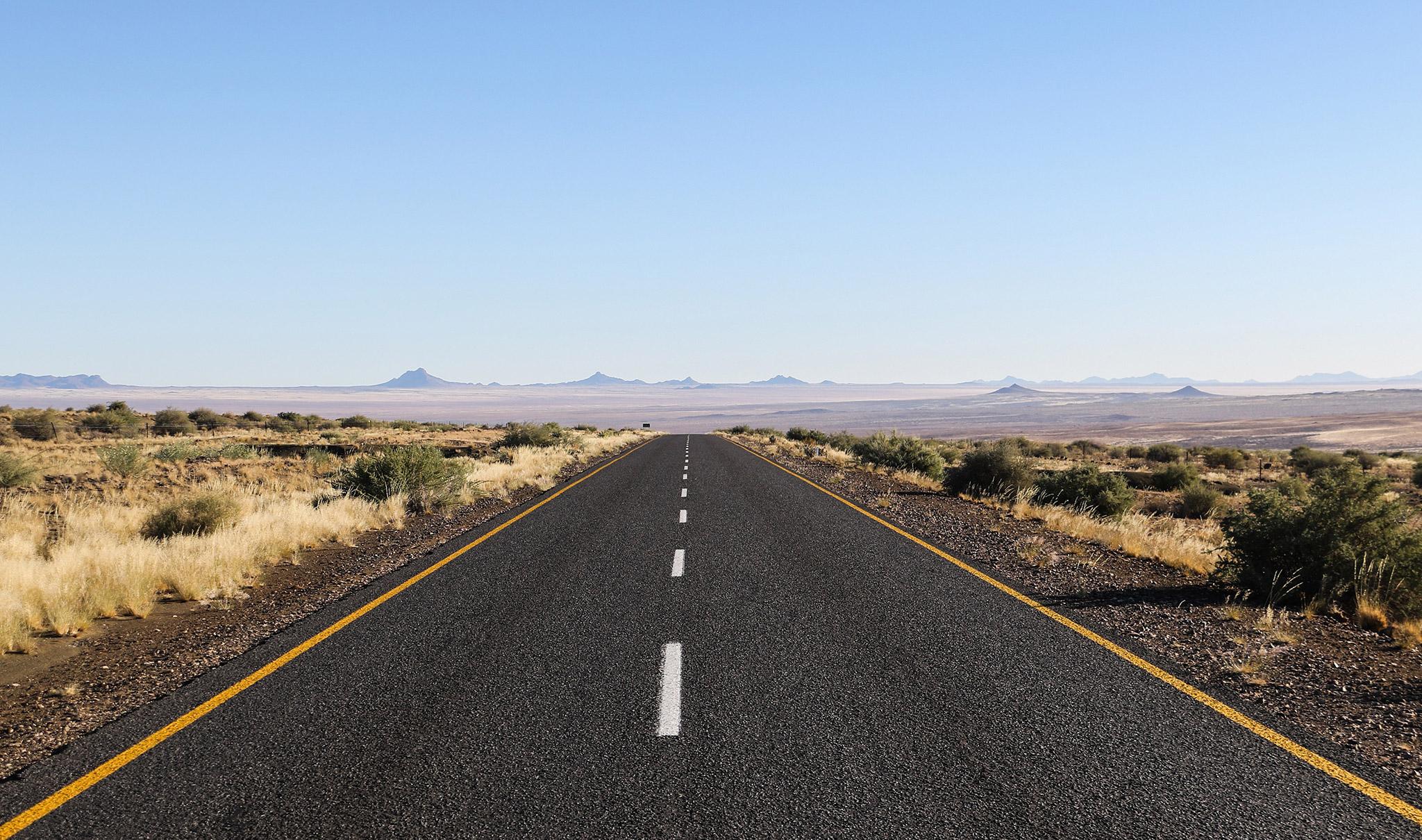 Straight tarmac road in Namibia