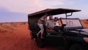 Game drive vehicle for sunset scenic drive in Namibia's Kalahari