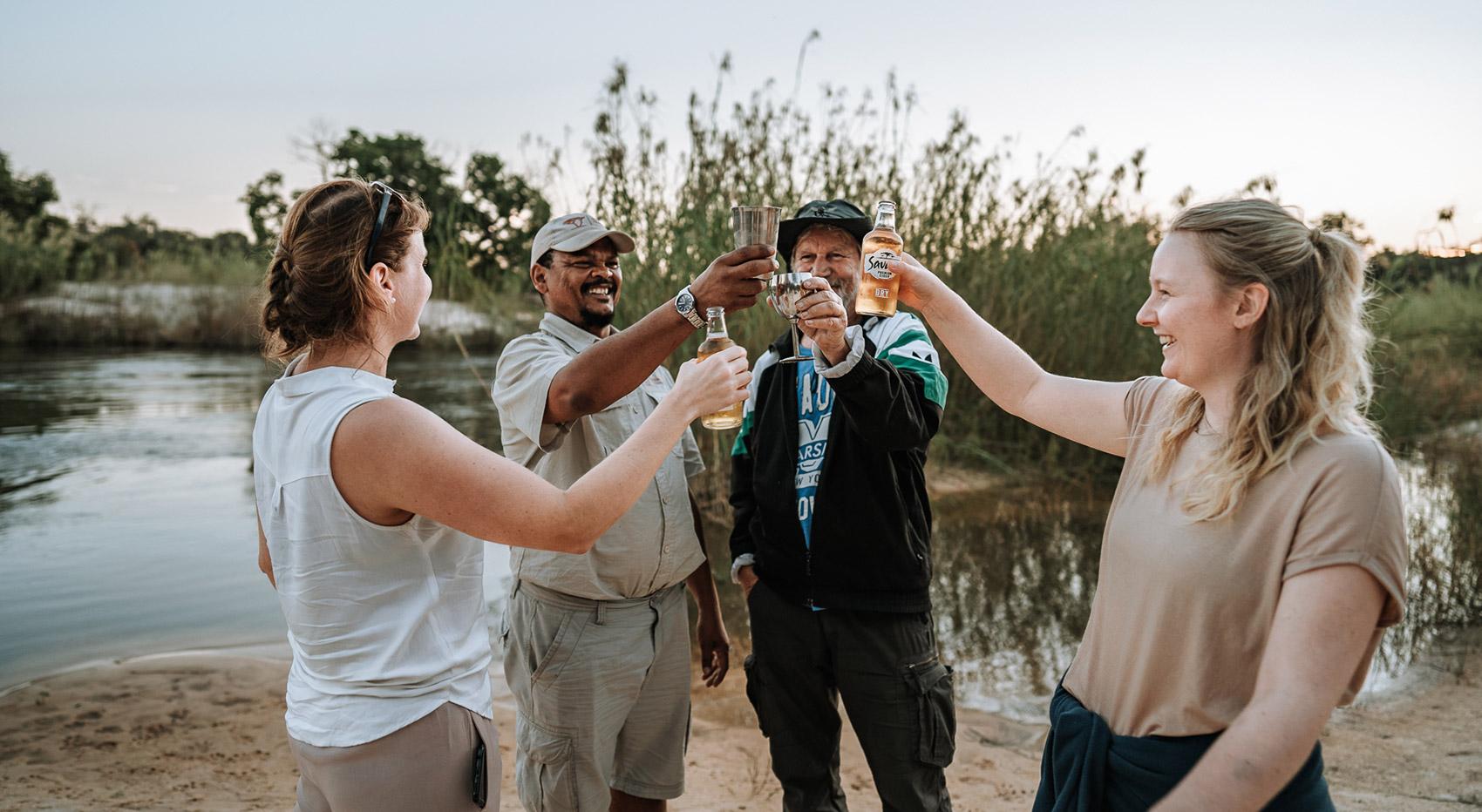 Group of travellers giving a toast