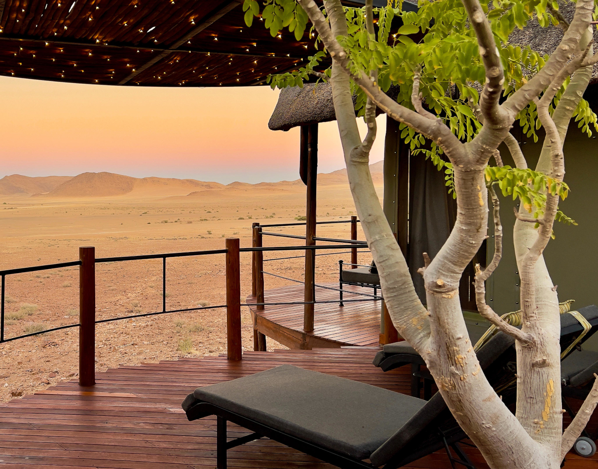 A sunset view of the Namib Desert in Namibia, seen from the cosy accommodation at Namib Outpost.