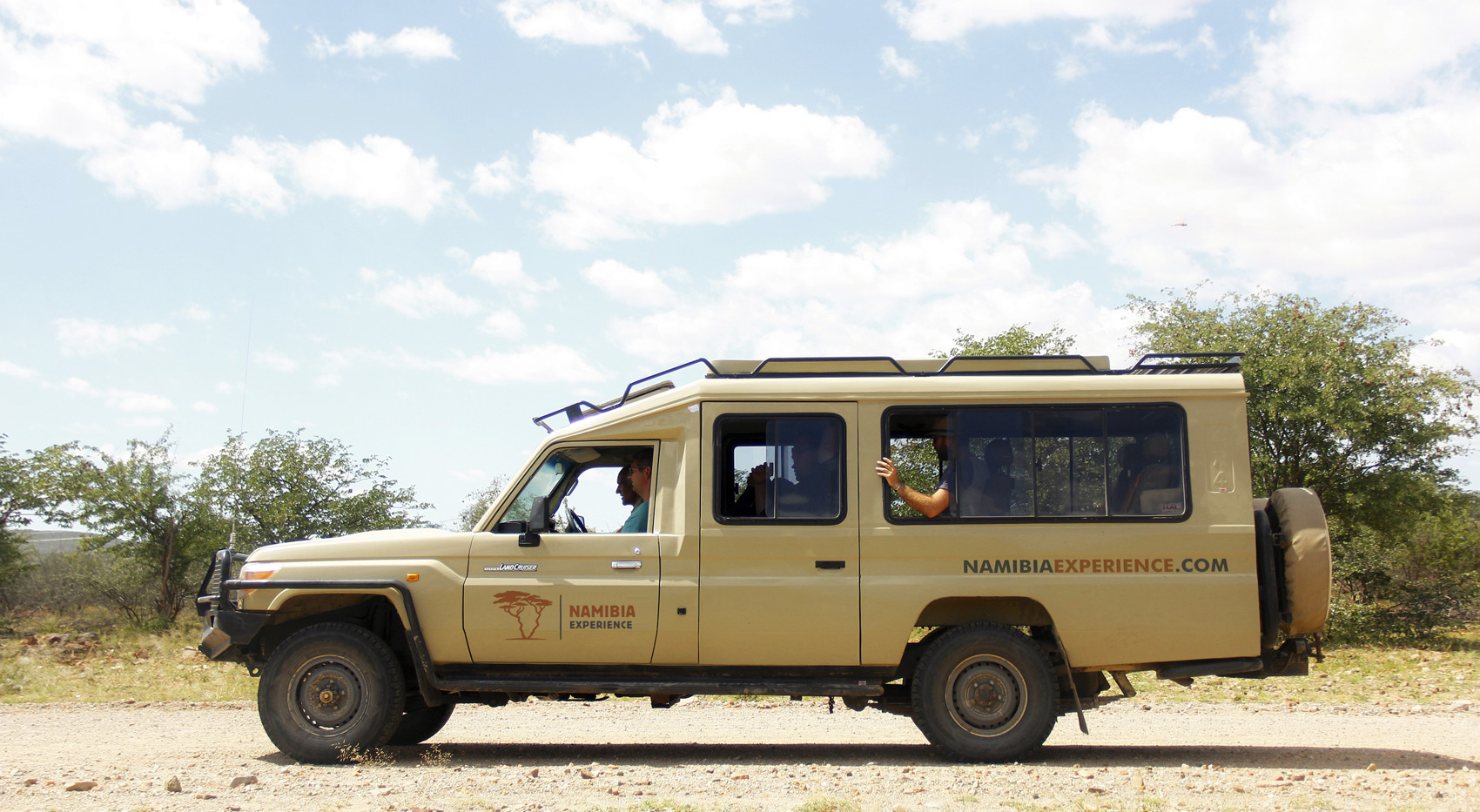 A Namibia-Experience safari Land Cruiser with guests. 