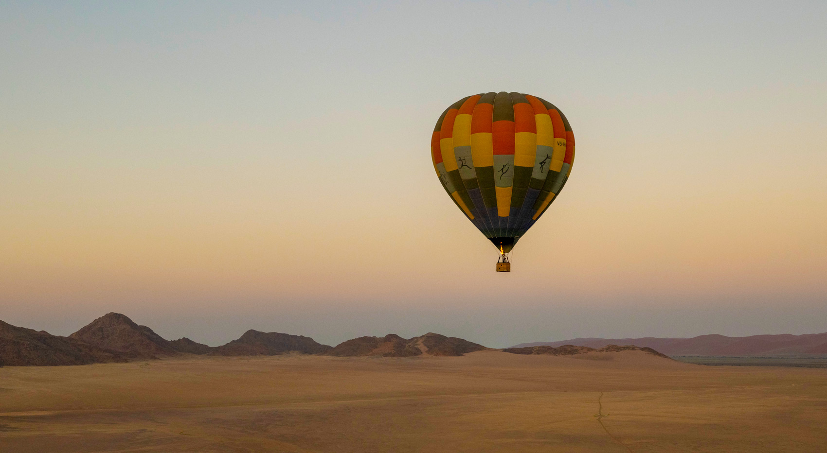 A balloon flying above the Namib Desert in Namibia.