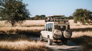 Guests in a game drive vehicle in Namibia