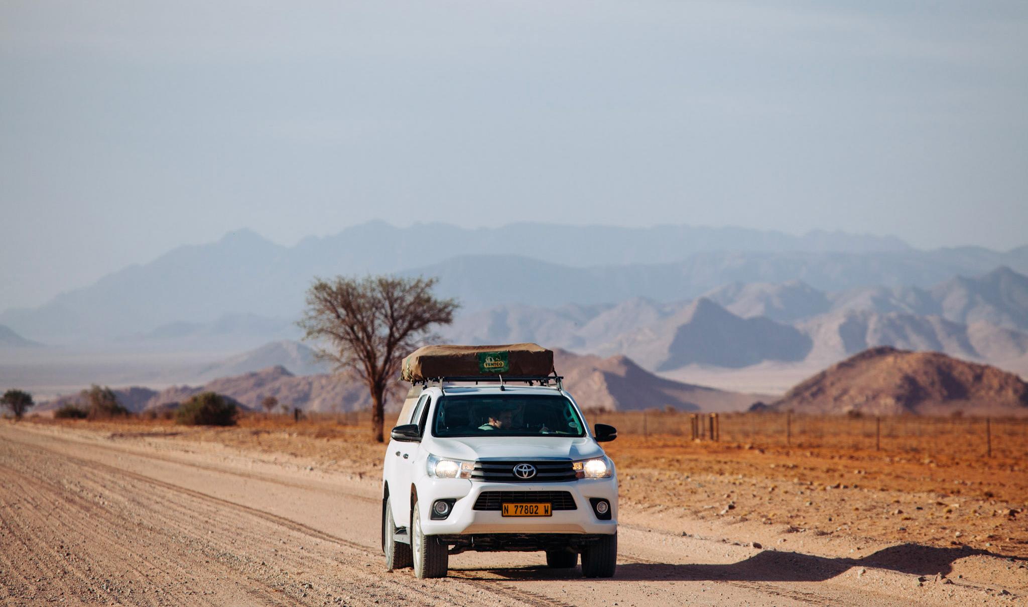 A guided-self-drive vehicle on the open road in Namibia.